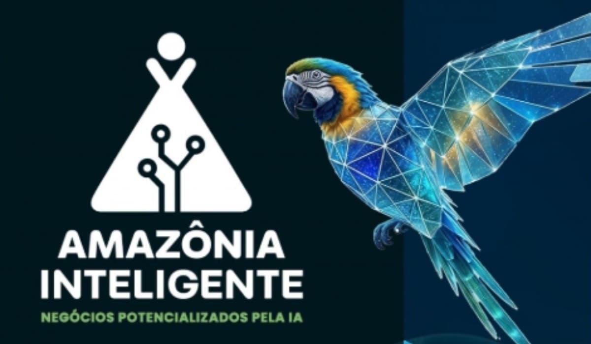 Auditório iluminado com tela projetando gráficos de inteligência artificial durante evento em Manaus.